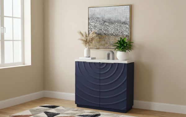 Radius Navy & White 2 Door Cabinet with contemporary MDF construction, faux marble top, and radiating ripple pattern for stylish, customizable storage.
